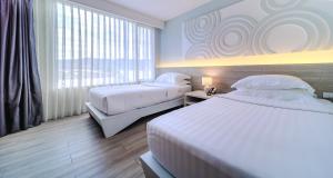 Voodi või voodid majutusasutuse Best Western Chaweng Samui toas