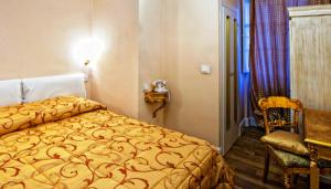 Postel nebo postele na pokoji v ubytování Boutique Hotel L'Imperatrice + 37 fotografií