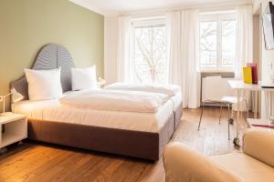 Letto o letti in una camera di Fuchsbräu