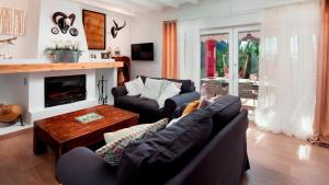 Posezení v ubytování Countryhouse La Niña Chole Cártama by Ruralidays