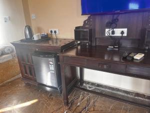 Köök või kööginurk majutusasutuses Sambha Hotel