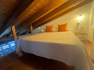 Ein Bett oder Betten in einem Zimmer der Unterkunft Buhardilla Con Encanto Centro Historico