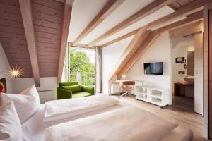 Letto o letti in una camera di Fuchsbräu