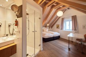 Letto o letti in una camera di Fuchsbräu
