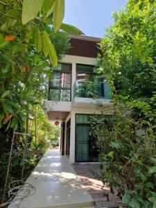 Zahrada ubytování Palmeraiebeach Resort Rayong ปาล์มมาลี บีช รีสอร์ท ระยอง 罗勇棕榈树海滩酒店
