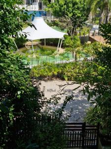 Zahrada ubytování Palmeraiebeach Resort Rayong ปาล์มมาลี บีช รีสอร์ท ระยอง 罗勇棕榈树海滩酒店