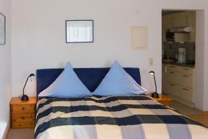 Postel nebo postele na pokoji v ubytování Gästehaus Schiff