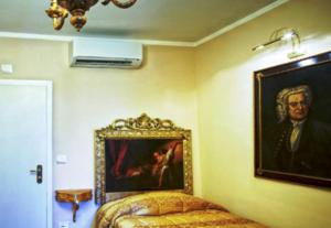 Postel nebo postele na pokoji v ubytování Boutique Hotel L'Imperatrice