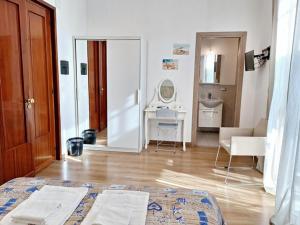 Posteľ alebo postele v izbe v ubytovaní B&B Favola Mediterranea