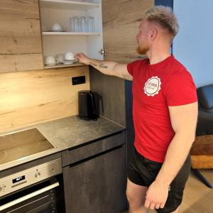 Kuchyň nebo kuchyňský kout v ubytování ELSA Spa Apartments Tux