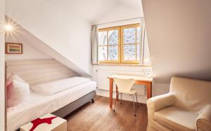 Letto o letti in una camera di Fuchsbräu