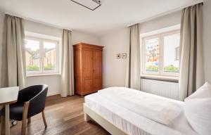 Letto o letti in una camera di Fuchsbräu