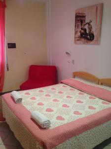Postel nebo postele na pokoji v ubytování Hotel Paolina