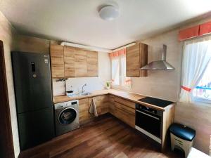 Kuchyň nebo kuchyňský kout v ubytování Apartmento El Pedregal
