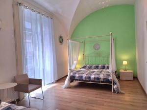Posteľ alebo postele v izbe v ubytovaní B&B Favola Mediterranea