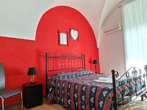Posteľ alebo postele v izbe v ubytovaní B&B Favola Mediterranea