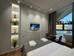 Voodi või voodid majutusasutuse Moonlight Apartments Tirana toas