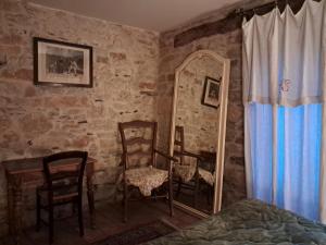 Postel nebo postele na pokoji v ubytování Nabat le Haut, chambre et table d'hotes