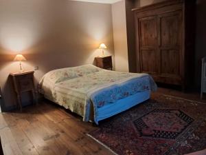 Postel nebo postele na pokoji v ubytování Nabat le Haut, chambre et table d'hotes