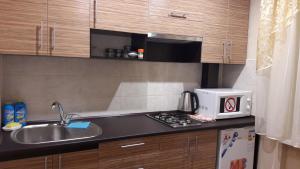 Η κουζίνα ή μικρή κουζίνα στο Apartment Тeslenka11