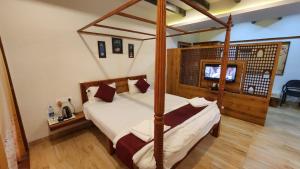 Postel nebo postele na pokoji v ubytování SeaFORT Beach Resort