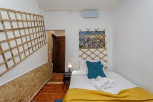 コスタ・ダ・カパリカにあるBeGuest Caparica Sun & Beachの窓のある部屋(タオル付)