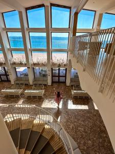 an overhead view of a building with stairs and windows at Hotel Dei Pini in Alghero