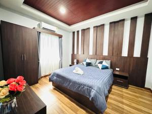 Ένα ή περισσότερα κρεβάτια σε δωμάτιο στο Arterra Haven Aonang Krabi