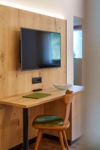 TV a/nebo společenská místnost v ubytování Hotel Lechner + 36 fotografií
