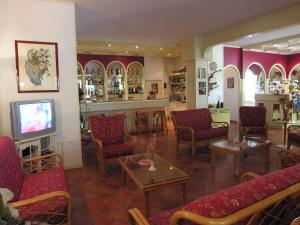 TV a/nebo společenská místnost v ubytování Hotel Cavalieri