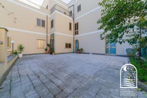 an empty parking lot in front of a building at Al Convento Bed & Breakfast Vasto Marina in Vasto