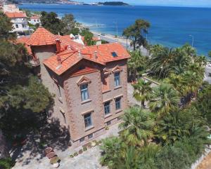 an aerial view of a house with an orange roof at Loriet Hotel in Mytilene +164 photos