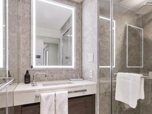 Koupelna v ubytování NewCZ Centum Hotel