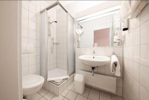 Koupelna v ubytování Hotel Residenz Limburgerhof + 18 fotografií