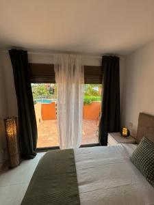 Postel nebo postele na pokoji v ubytování Apartamento nueva Sotoserena