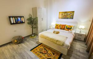 Ένα ή περισσότερα κρεβάτια σε δωμάτιο στο Imperial Resort Hurghada +17 φωτογραφίες