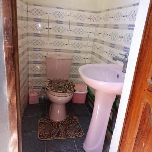 Koupelna v ubytování Appart'hôtel Chez les Zafifou