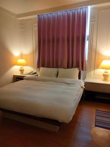 Voodi või voodid majutusasutuse DC Hotel toas