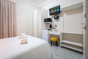 Postel nebo postele na pokoji v ubytování Di Fiore BED BREAKFAST