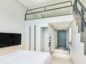 Postel nebo postele na pokoji v ubytování NewCZ Centum Hotel