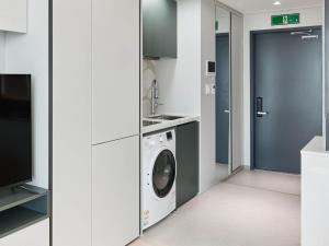 Kuchyň nebo kuchyňský kout v ubytování NewCZ Centum Hotel