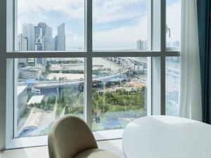 Postel nebo postele na pokoji v ubytování NewCZ Centum Hotel + 37 fotografií