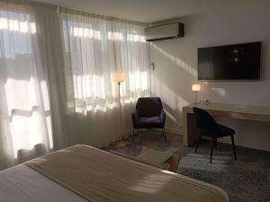Postel nebo postele na pokoji v ubytování Mercure Limoges Centre + 37 fotografií