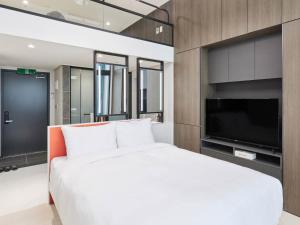 TV a/nebo společenská místnost v ubytování NewCZ Centum Hotel