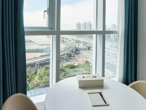 Nespecifikovaný výhled na destinaci Pusan nebo výhled na město při pohledu z hotelu