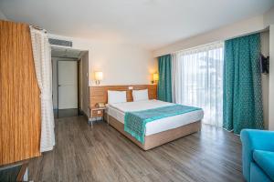 Postel nebo postele na pokoji v ubytování Tu Casa Gelidonya Hotel + 35 fotografií