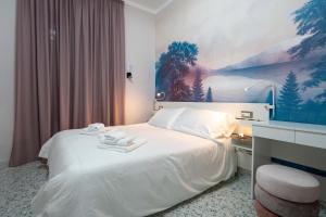 Postel nebo postele na pokoji v ubytování Di Fiore BED BREAKFAST