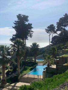 Hồ bơi trong/gần Departamento Condominio Pinares del Canelillo 5 personas