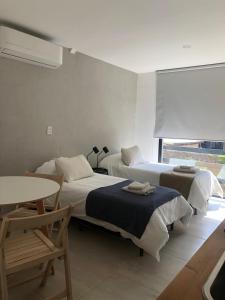 Cama ou camas em um quarto em The owl lodge