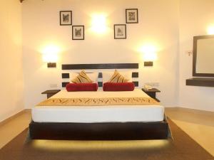 Postel nebo postele na pokoji v ubytování Hotel Kamrel Sigiriya
